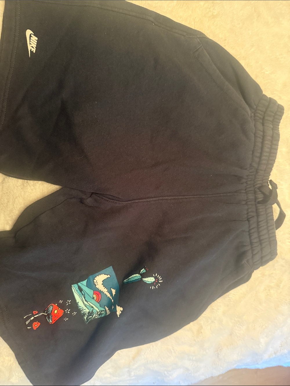 Nike Black Kids Graphic Shorts with Teal & Red Accents